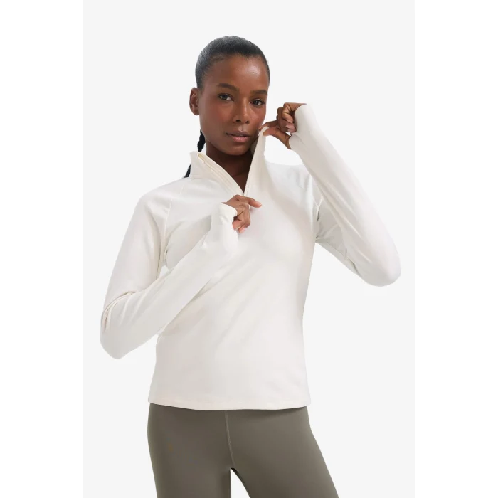 Defacto B0811AXER105 Ekru DeFactoFit Standart Fit Dik Yaka Fermuarlı İçi Yumuşak Tüylü Sporcu Uzun Kollu Tişört