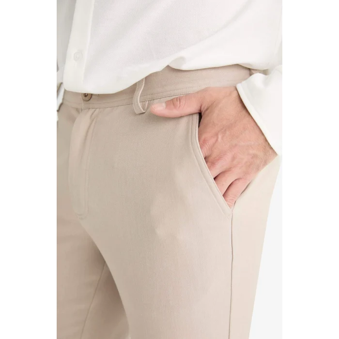 Defacto C7508AXBG766 Bej Tailored Fit Düz Paça Her Yöne Esneyen Yumuşak Tuşe Cepli Pantolon