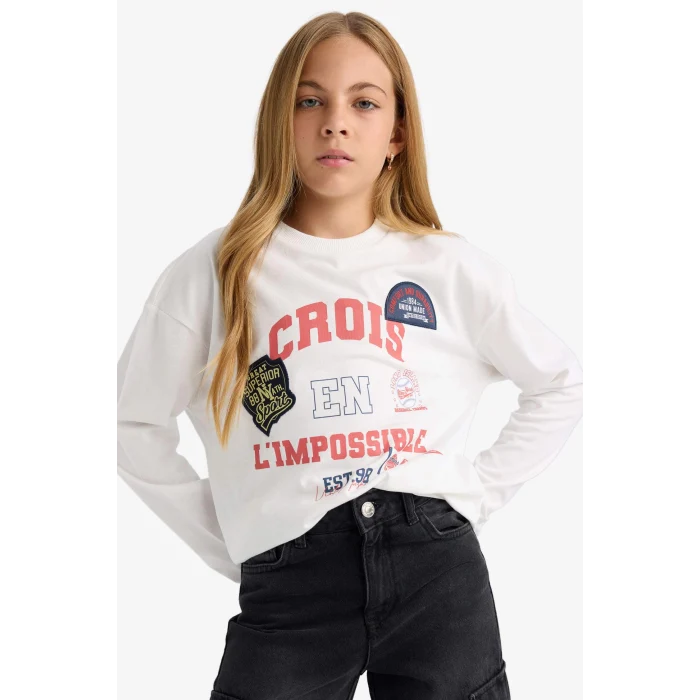 Defacto F7581A8ER105 Ekru Kız Çocuk Oversize Geniş Kalıp Bisiklet Yaka Baskılı Uzun Kollu Okul Tişörtü