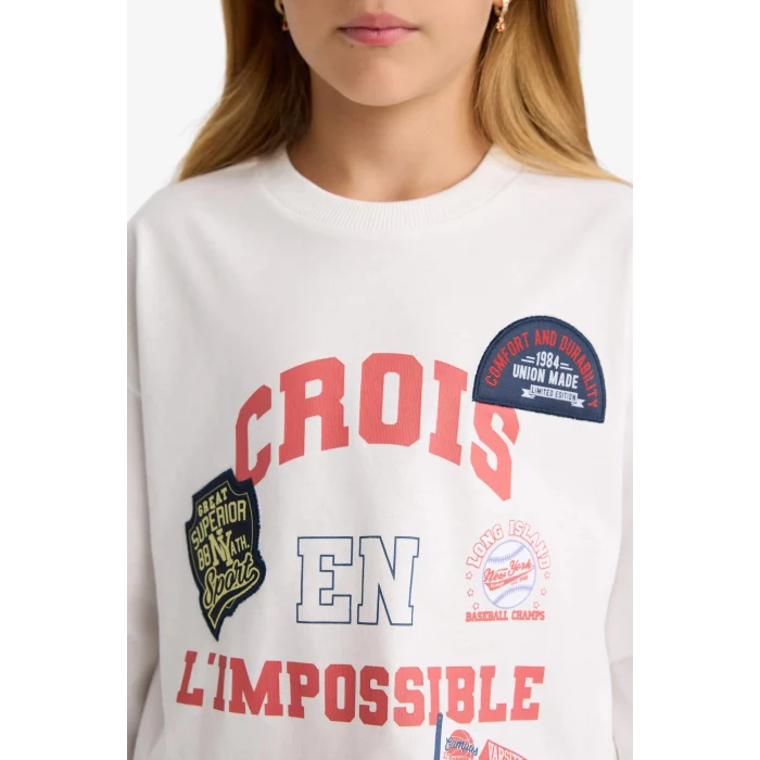 Defacto F7581A8ER105 Ekru Kız Çocuk Oversize Geniş Kalıp Bisiklet Yaka Baskılı Uzun Kollu Okul Tişörtü