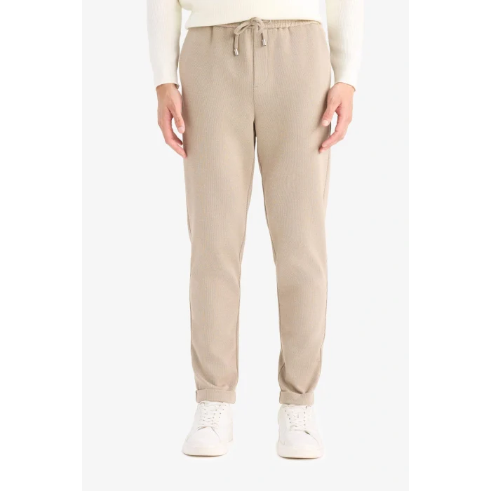 Defacto Y2651AZBG773 Bej Jogger Fit Beli Bağcıklı Lastikli Esnek Kumaş Cepli Duble Paça Pantolon