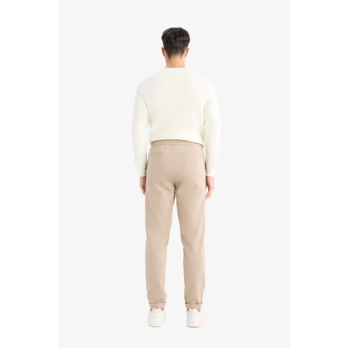 Defacto Y2651AZBG773 Bej Jogger Fit Beli Bağcıklı Lastikli Esnek Kumaş Cepli Duble Paça Pantolon