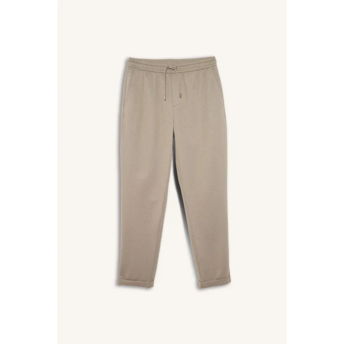 Defacto Y2651AZBG773 Bej Jogger Fit Beli Bağcıklı Lastikli Esnek Kumaş Cepli Duble Paça Pantolon