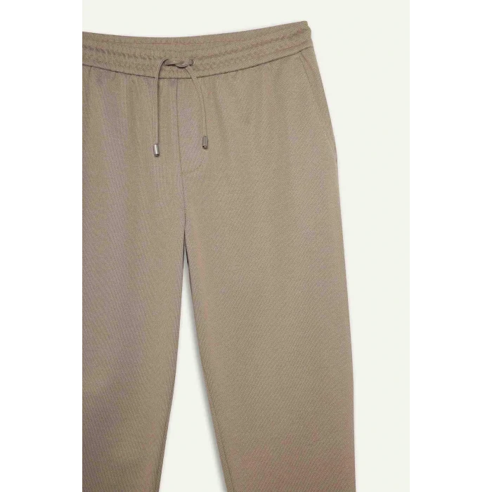 Defacto Y2651AZBG773 Bej Jogger Fit Beli Bağcıklı Lastikli Esnek Kumaş Cepli Duble Paça Pantolon