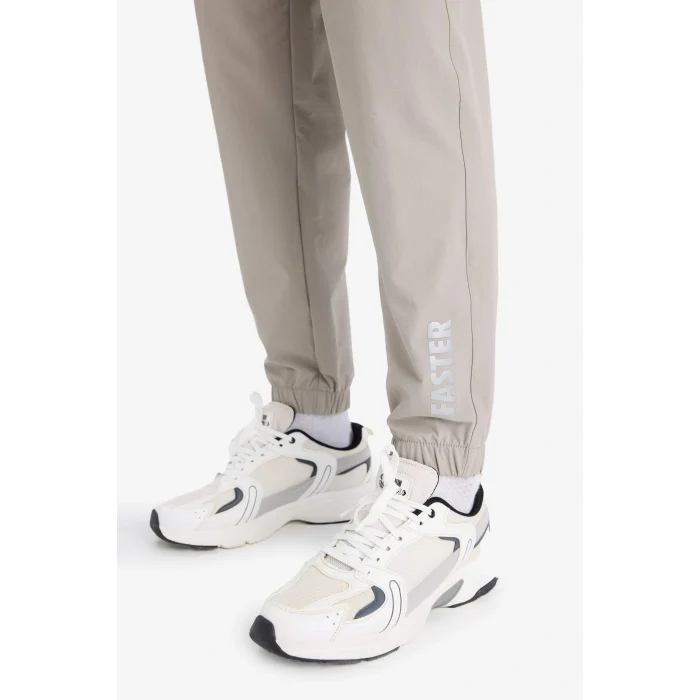 Defacto F1288AXGR317 Gri Slim Fit Dar Kesim Fermuar Cepli Dokuma Sporcu Jogger Eşofman Altı