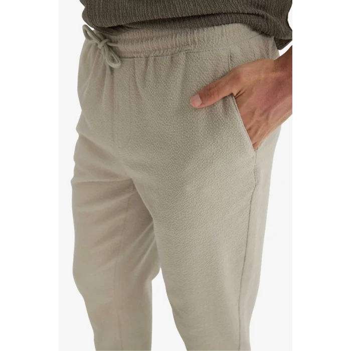 Defacto F3269AXKH475 Haki Jogger Fit Beli Bağcıklı Lastikli Cepli Pamuklu Dokulu Pantolon