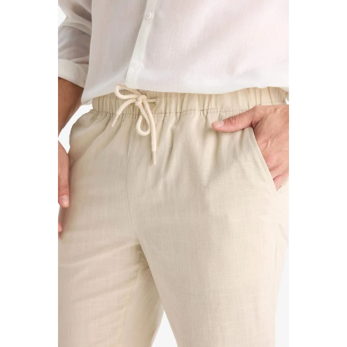 Defacto Z6475AZBG766 Bej %100 Pamuk Jogger Fit Beli Bağcıklı Lastikli Dar Paça Cepli Pantolon