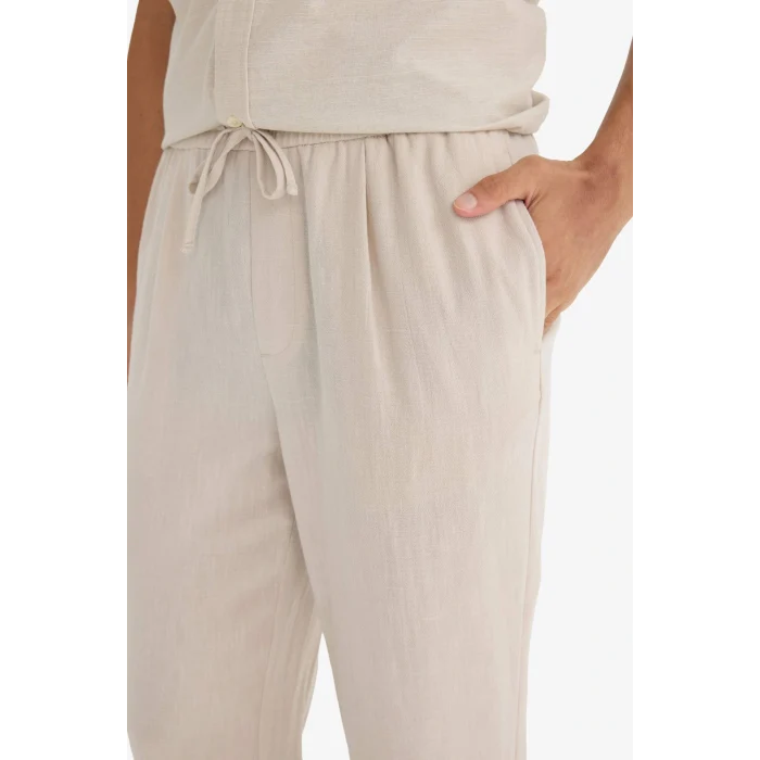 Defacto E4790AXER22 Ekru Relax Fit Kısa Paça Keten Görünümlü Beli Bağcıklı Lastikli Cepli Pantolon