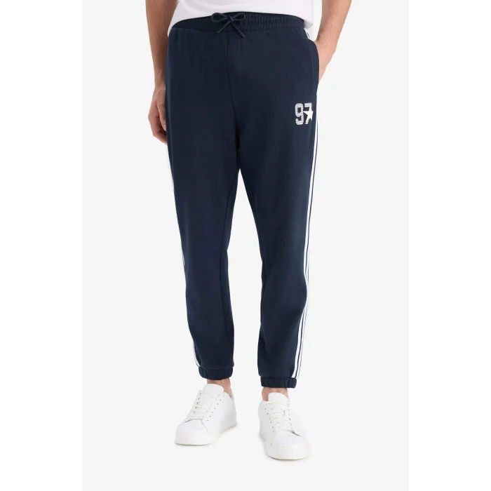 Defacto E9665AXNV64 Lacivert Regular Fit Beli Bağcıklı Cepli Paçası Lastikli Baskılı Jogger Eşofman Altı