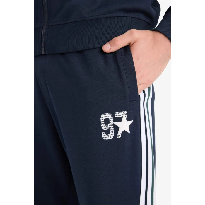 Defacto E9665AXNV64 Lacivert Regular Fit Beli Bağcıklı Cepli Paçası Lastikli Baskılı Jogger Eşofman Altı