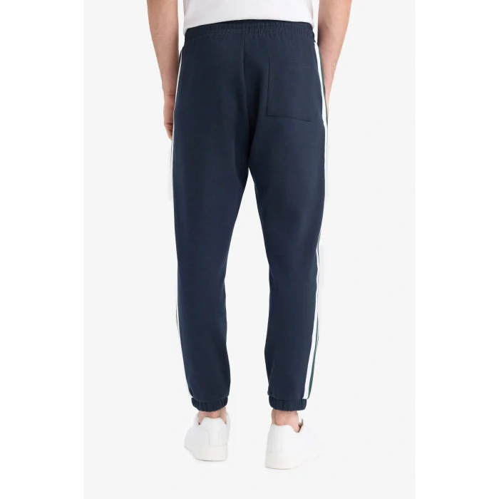 Defacto E9665AXNV64 Lacivert Regular Fit Beli Bağcıklı Cepli Paçası Lastikli Baskılı Jogger Eşofman Altı