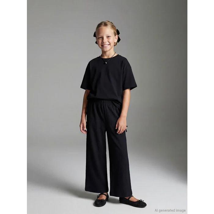 LCW Kids Siyah Beli Lastikli Fiyonk Detaylı Kız Çocuk Pantolon