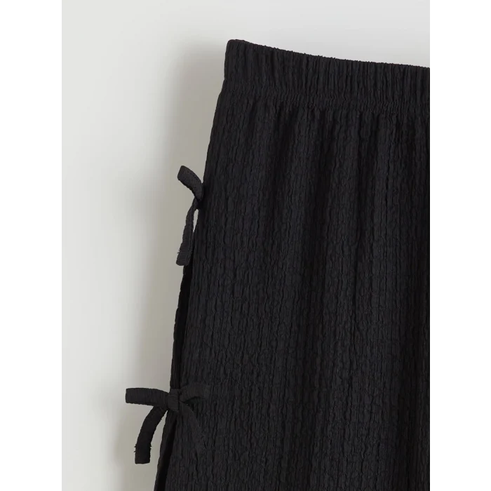 LCW Kids Siyah Beli Lastikli Fiyonk Detaylı Kız Çocuk Pantolon