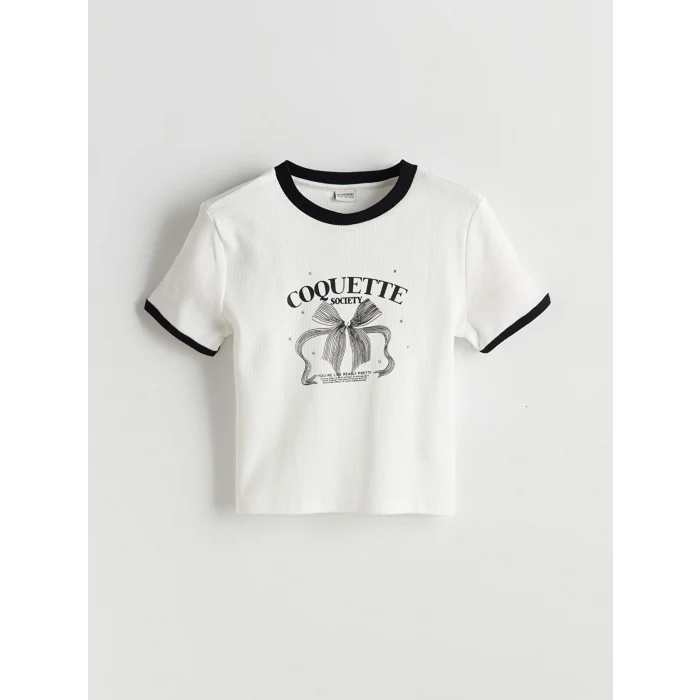 LCW Kids Ekru Bisiklet Yaka Fiyonk Baskılı Taşlı Kız Çocuk Tişört