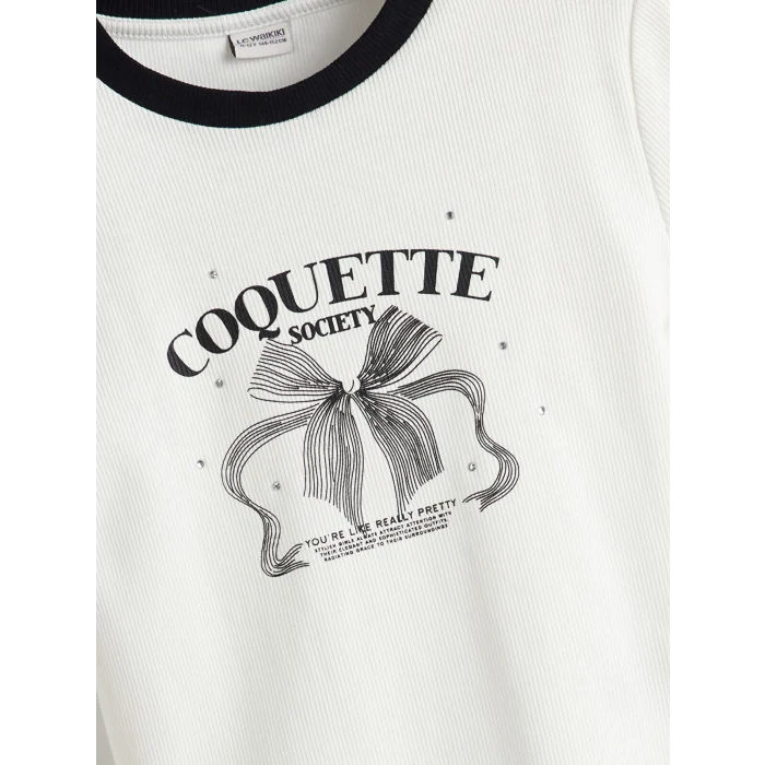 LCW Kids Ekru Bisiklet Yaka Fiyonk Baskılı Taşlı Kız Çocuk Tişört