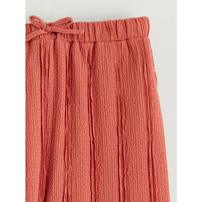 LCW Kids Pembe Kız Çocuk Geniş Paça Dokulu Pantolon