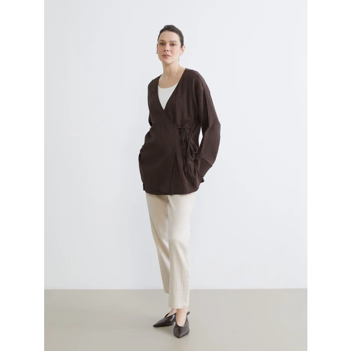 LCWAIKIKI Classic Bej Beli Lastikli Havuç Kesim Kadın Müslin Pantolon