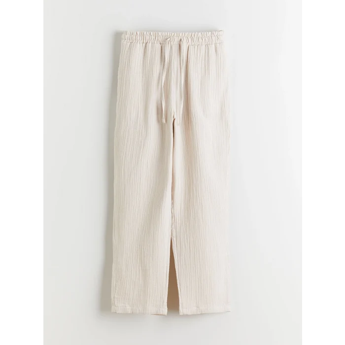 LCWAIKIKI Classic Bej Beli Lastikli Havuç Kesim Kadın Müslin Pantolon