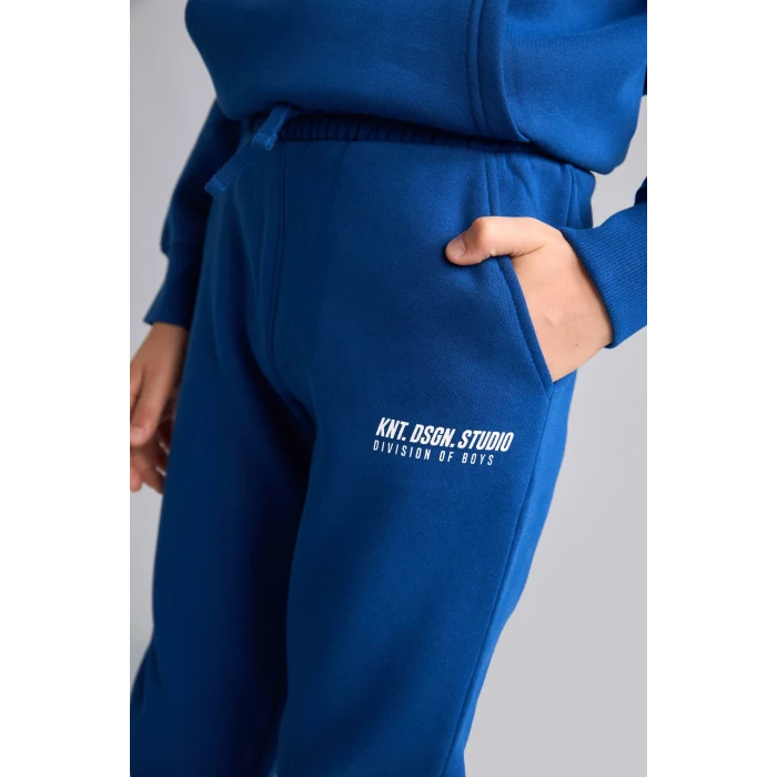 Defacto H9685A8BE842 Mavi Baskılı Lastikli Paça Kalın Kumaş Jogger Eşofman Altı Erkek Çocuk
