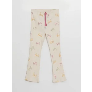 LCW Kids Ekru Beli Lastikli Baskılı ispanyol Paça Kız Çocuk Tayt