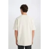 Defacto D5494 Ekru Boxy Fit Bisiklet Yaka Baskılı Kısa Kollu Ağır Kumaş Tişört