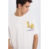 Defacto B3894 Ekru DeFactoFit NBA Los Angeles Lakers Oversize Geniş Kalıp Bisiklet Yaka Kısa Kollu Tişört