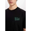 Defacto D5467 Siyah Rick and Morty Regular Fit Bisiklet Yaka Sırt Baskılı Kısa Kollu Tişört
