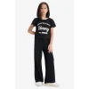 Defacto E0415 Siyah Kız Çocuk 2li Takım Fitilli Kaşkorse Baskılı Kısa kollu Tişört Wide Leg Geniş Bol Paça Pantolon