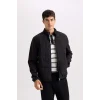 Defacto D7532 Siyah Slim Fit Dar Kesim Dik Yaka Lastikli ve Fermuarlı Su Geçirmez Mont