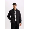 Defacto D7532 Siyah Slim Fit Dar Kesim Dik Yaka Lastikli ve Fermuarlı Su Geçirmez Mont