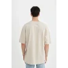 Defacto C2497 Bej Comfort Regular Fit Rahat Kalıp Bisiklet Yaka Baskılı Kısa Kollu Tişört