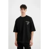 Defacto C2244 Siyah Loose Fit Bisiklet Yaka Sırt Baskılı Kısa Kollu Tişört
