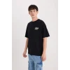 Defacto D6790 Siyah Tom & Jerry Boxy Fit Bisiklet Yaka Sırt Baskılı Kısa Kollu Tişört