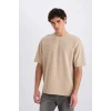 Defacto X3926 Bej Oversize Geniş Kalıp Ütü Gerektirmeyen Bisiklet Yaka Kısa Kollu Basic Düz Ağır Kumaş Tişört