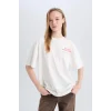 Defacto E0635 Beyaz Coool Oversize Geniş Kalıp Bisiklet Yaka Sırt Baskılı Kısa Kollu Tişört