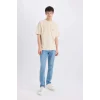 Defacto E0906 Bej %100 Pamuk Boxy Fit Bisiklet Yaka Sırt Baskılı Kısa Kollu Tişört