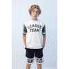 Defacto C3898 Ekru Erkek Çocuk Oversize Geniş Kalıp Bisiklet Yaka Baskılı Kısa Kollu Tişört