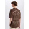 Defacto E4539 Kahve %100 Pamuk Boxy Fit Bisiklet Yaka Sırt Baskılı Kısa Kollu Tişört