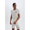 Defacto C1748 Beyaz DeFactoFit Standart Fit Bisiklet Yaka Baskılı Ağır Kumaş Kısa Kollu Sporcu Tişört