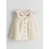 LCW baby Ekru Çiçek Nakışlı Müslin Kız Bebek Elbise