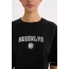 Defacto B9953 Siyah DeFactoFit NBA Brooklyn Nets Cropped Fit Bisiklet Yaka Kısa Kollu Tişört