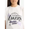 Defacto E7632 Ekru Kız Çocuk NBA Los Angeles Lakers Bisiklet Yaka Kısa Kollu Tişört