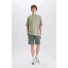 Defacto B8673 Yeşil %100 Pamuk Slim Fit Dar Kesim Dar Paça Cepli Basic Düz Şort