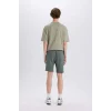 Defacto B8673 Yeşil %100 Pamuk Slim Fit Dar Kesim Dar Paça Cepli Basic Düz Şort