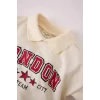 Defacto D7874 Ekru Kız Bebek 2li Takım Polo Yaka Baskılı Sweatshirt Beli Lastikli Geniş Bol Paça Eşofman Altı