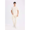 Defacto V7699 Ekru %100 Pamuk New Regular Fit Bisiklet Yaka Basic Düz Kısa Kollu Tişört