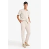 Defacto E4790AXER22 Ekru Relax Fit Kısa Paça Keten Görünümlü Beli Bağcıklı Lastikli Cepli Pantolon