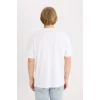 Defacto D5568AXWT34 Beyaz %100 Pamuk Boxy Fit Bisiklet Yaka Baskılı Kısa Kollu Tişört