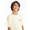 LCW Kids Bej Bisiklet Yaka Oversize Tok Kumaş Erkek Çocuk Tişört