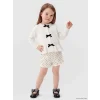 LCW baby Ekru Fiyonk Detaylı Bisiklet Yaka Kız Bebek Triko Hırka